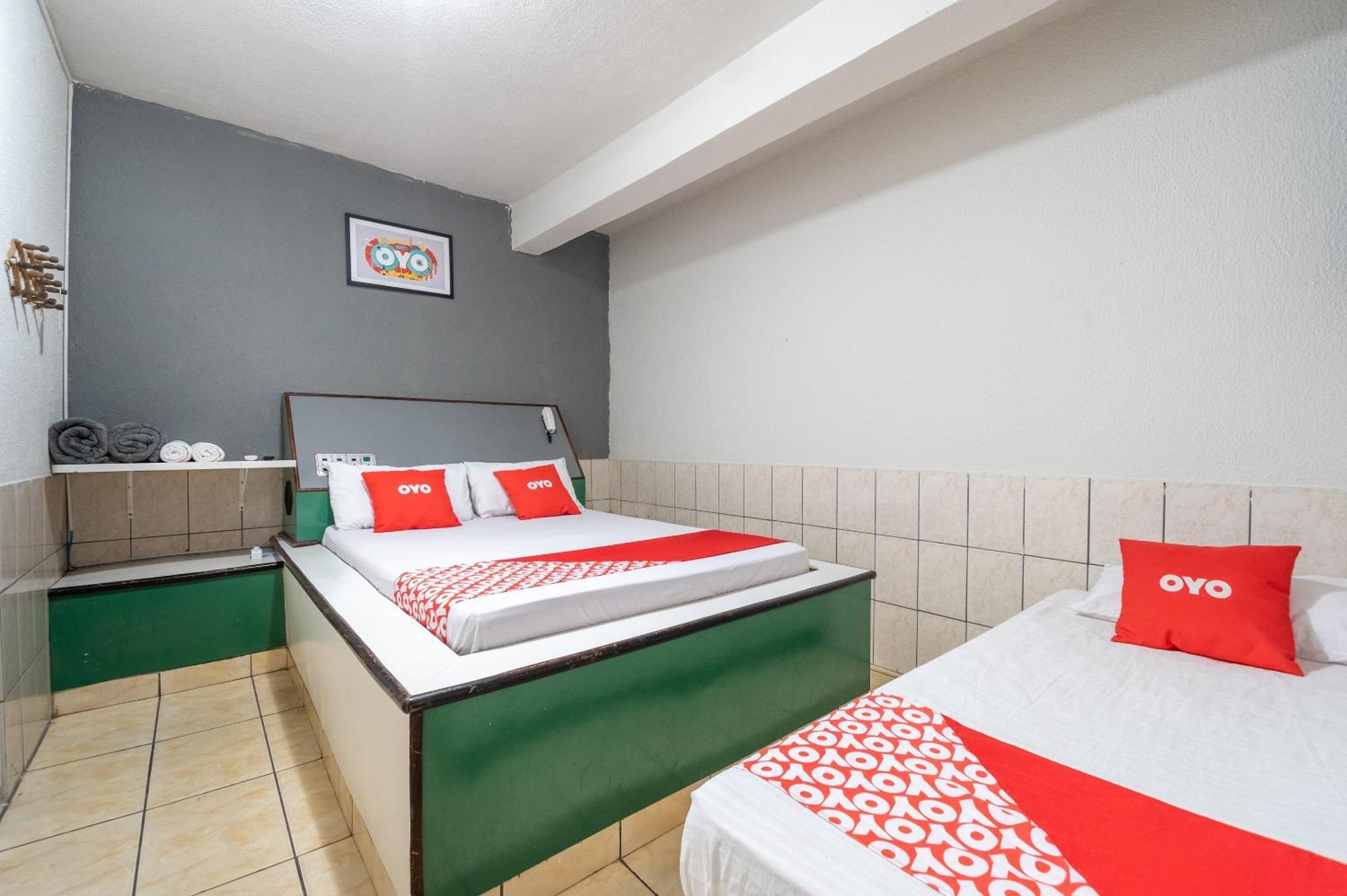 Triple Room (1 Double bed + 1 Single bed)